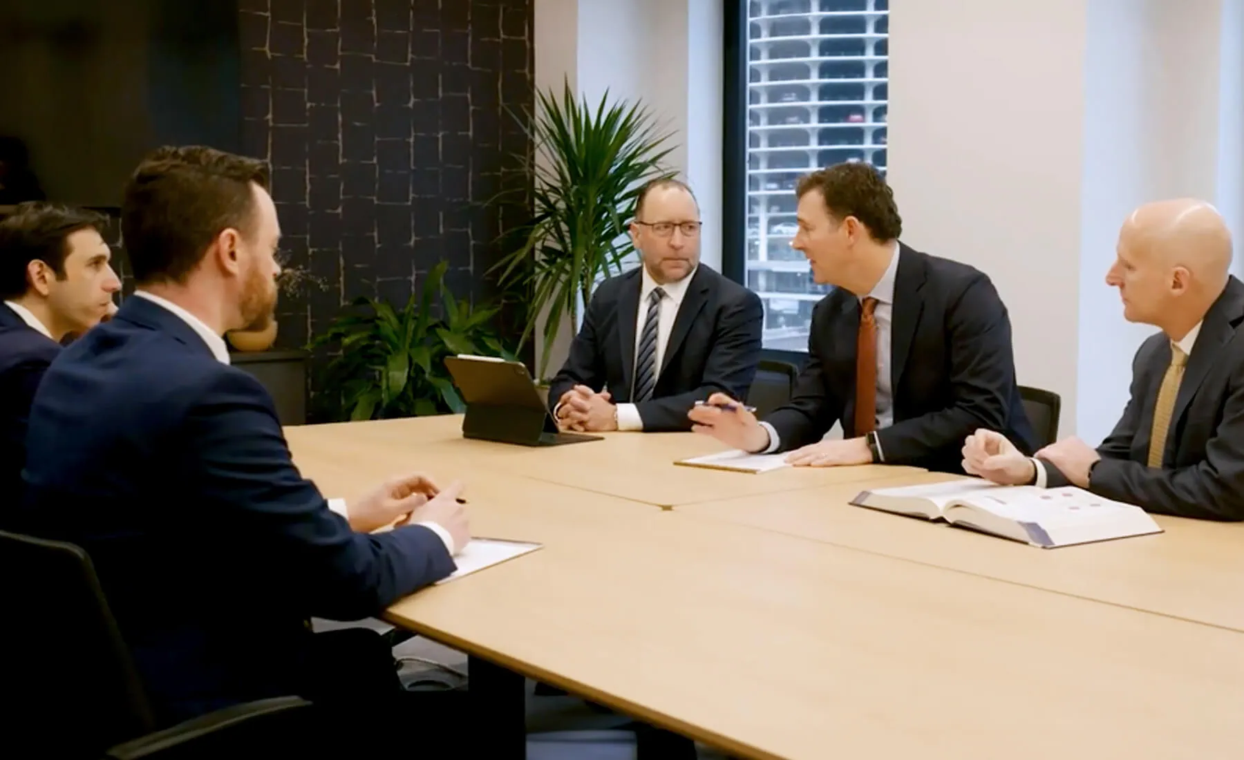 Chicago personal injury lawyers meeting in conference room